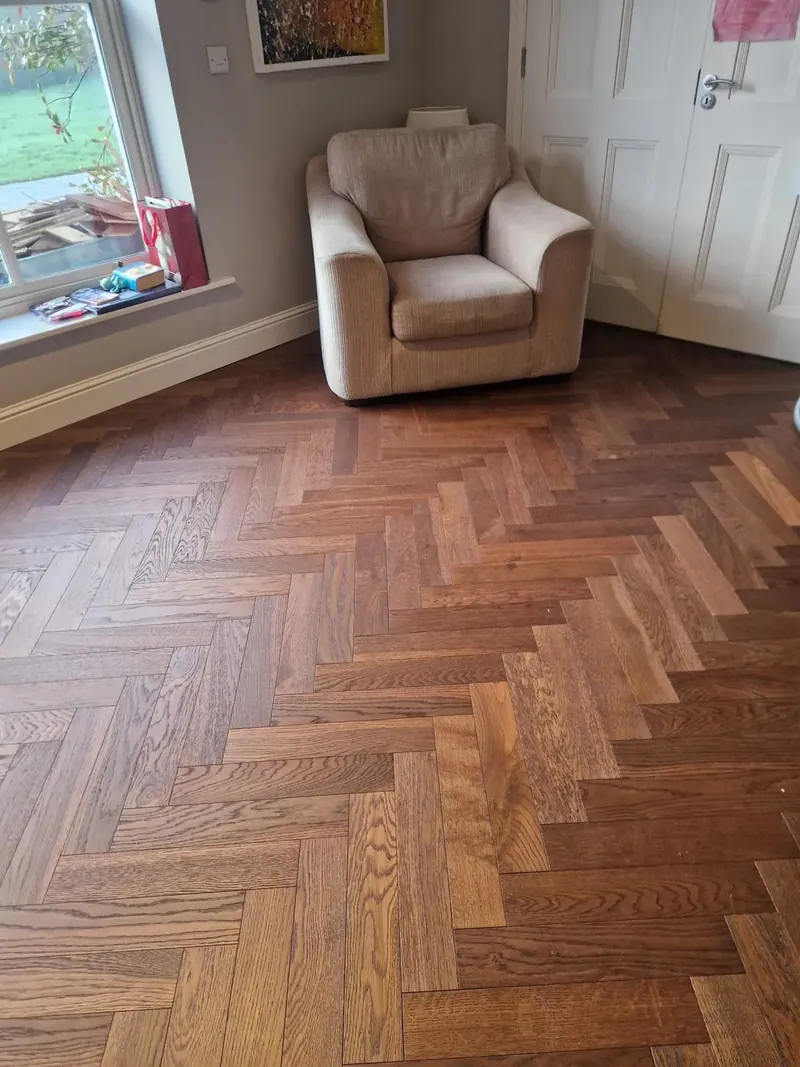 Warm-toned herringbone with a rich satin finish